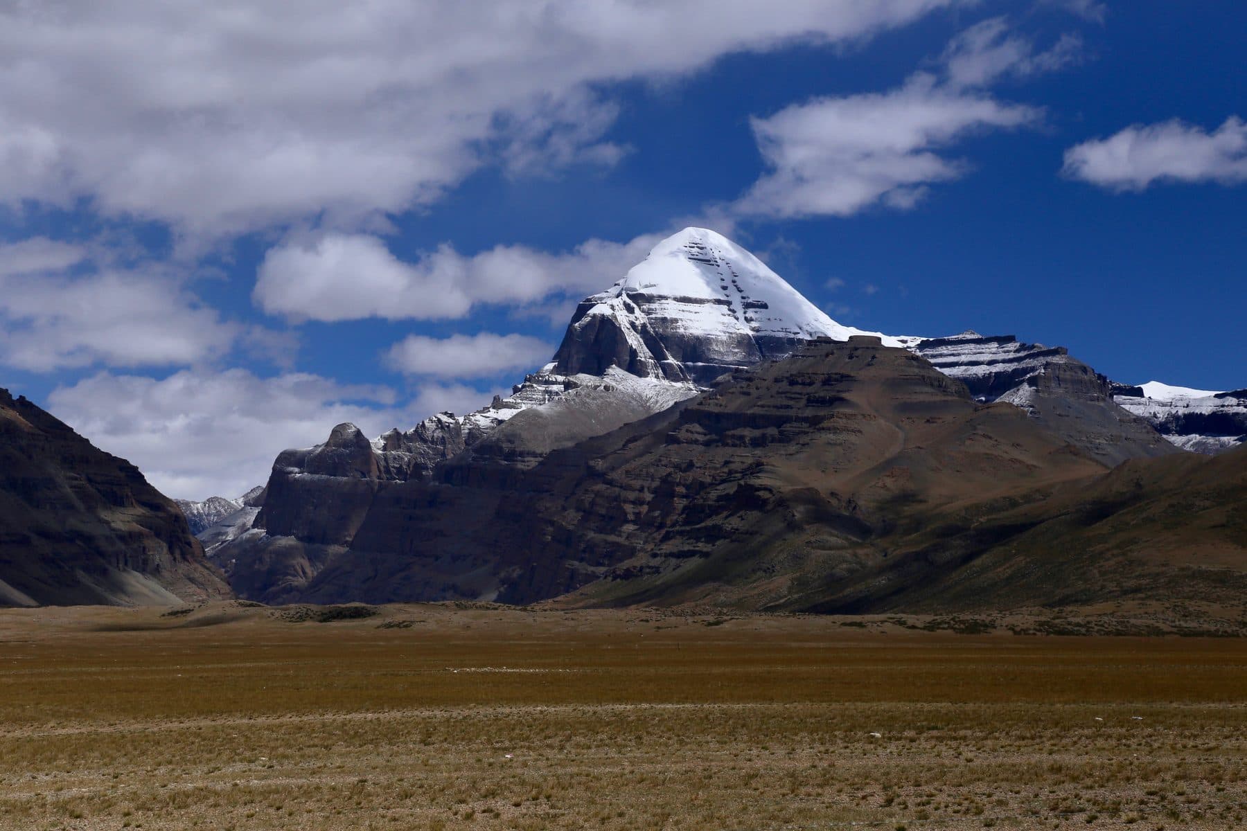 The snow-capped pyramidal peak of Mount Kailash, Tibet