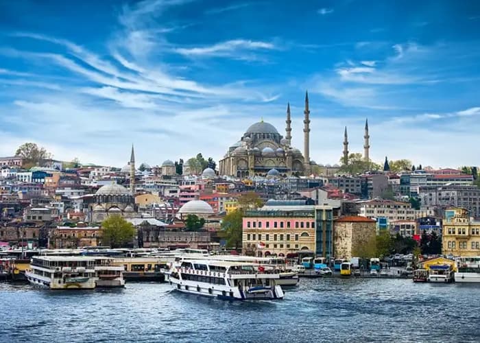 Istanbul's waterfront skyline with the Suleymaniye Mosque and ferries on the Bosphorus